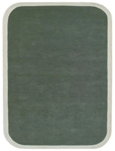 Sage green solid hand tufted wool area rug with cream border.